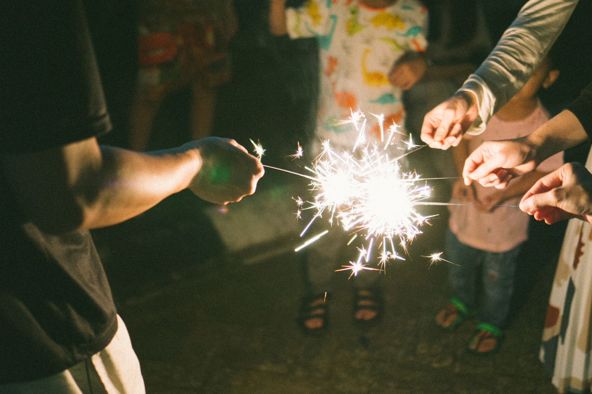 Hand playing fireworks